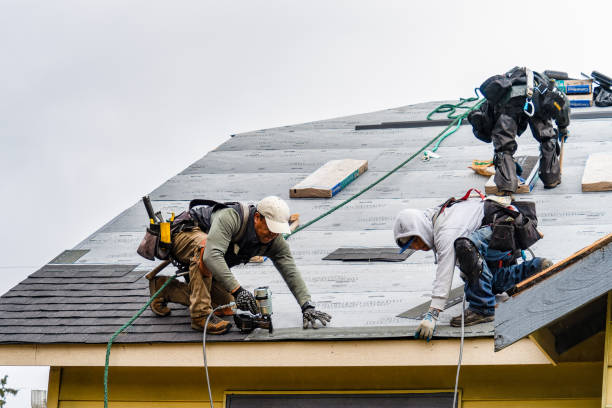 Professional Gutter Installation technician working in Greene, IA